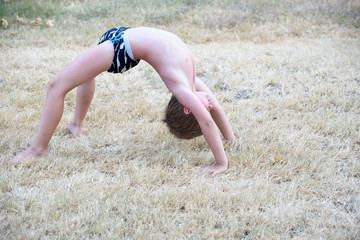 The boy doing gymnastics exersise