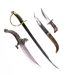 A collection of ancient oriental knives, vintage curved knives