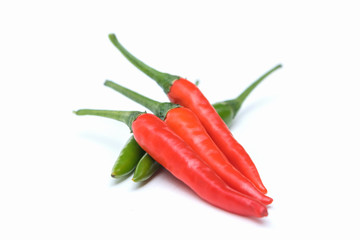Close up green and red chili pepper on white background isolated.