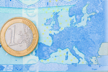 Finance concept : close - up shot of one euro coin on Europe map background.
European debt crisis.
