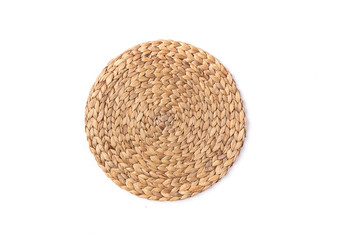 Light brown/beige round place mat on a white background