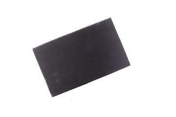 Isolated rectangular black cheese board on a white background 