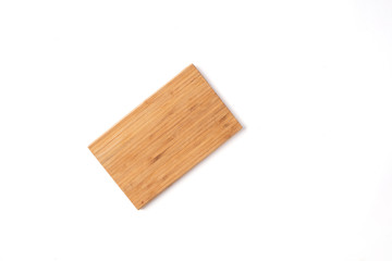 Wooden cheese/cutting board on a white background