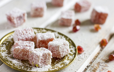 Turkish delight on white wood background