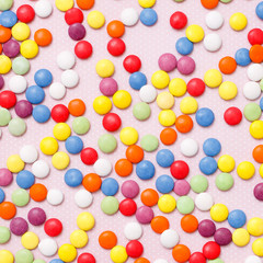 Lollipops sweets. Candy, top view flat lay on pink background. Sweet sucker, lollipop, candy, minimal concept above decoration, food background