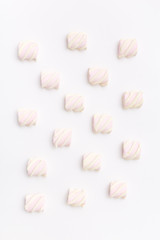 Pattern sweet marshmallow, candy on white background, top view flat lay. Isolated minimal concept above decoration, view white marshmallow, food background