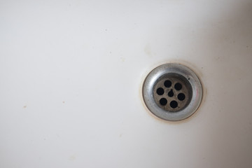 Closeup of stainless steel drain