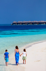 Mother and kids at tropical beach