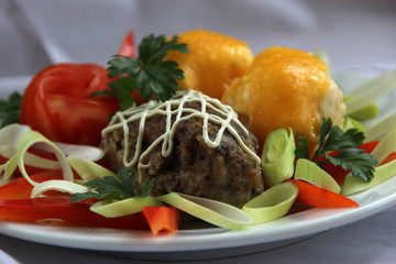 Russian cutlet with potatos, cheese and vegetables