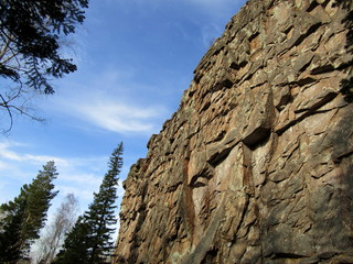 The rocks and the sky is blue