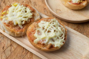 Fresh mini buns topped with pizza