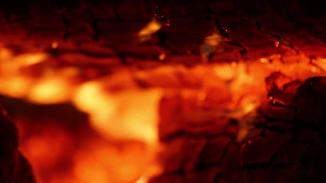 Burning wood in a stove close up