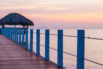 Beautiful sunset on a pier near Krong Kampot city in Cambodia