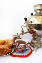 Samovar and cup on a light background