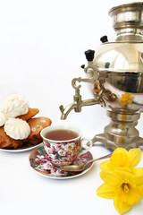 Samovar and cup on a light background
