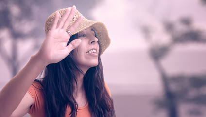 Woman waving hand background defocused © KostaKostov