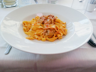 Italian typical dish of pasta cooked according to tradition with seafood