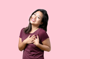 Young woman showing her heartfelt gratitude