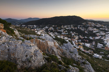 Fototapeta na wymiar View of Agia Marina village on Leros island in Greece at sunset. 