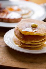 homemade pabcake with maple syrup for breakfast