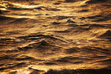 Abstract water texture background. Sun reflected on water