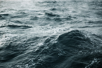 Abstract water texture background. Sun reflected on water