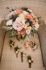 Beautiful bridal bouquet and boutonniere. Wedding floristry