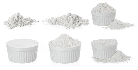 Bowl of white flour isolated on white background