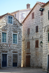 Fototapeta na wymiar A street in Old Town in Stari Grad, Croatia