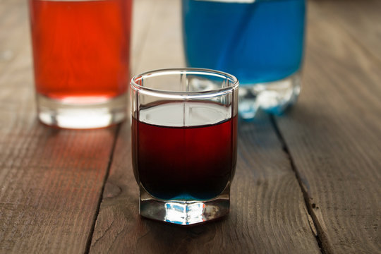 alcohol shot drink two layers red and blue