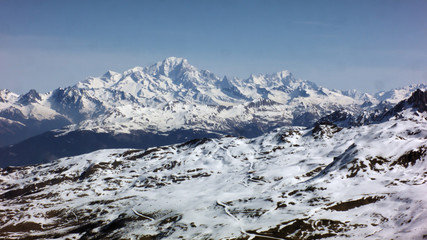 Mont Blanc during spring- blurred mountain ridge at distance 