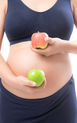 Pregnant woman holding green and red apple on isolate white background,Healthy Food Concept