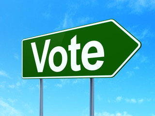 Politics concept: Vote on road sign background