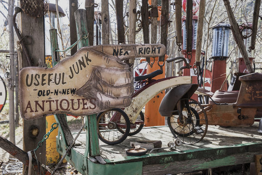 Useful Junk and Antiques sign with pedal cars, Embudo Station, NM