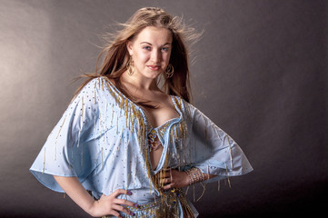 Portrait of a blonde in a dance suit

