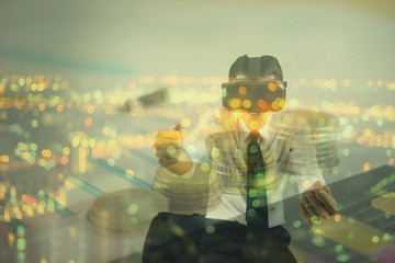 double exposure man wearing virtual reality in modern coworking studio. Smartphone using with VR Box google 3D Virtual Reality Glasses headset and city scape,vintage color