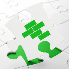 Fototapeta premium Construction concept: Bricks on puzzle background