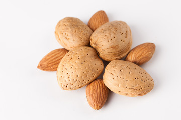 Whole almonds nuts isolated on white background