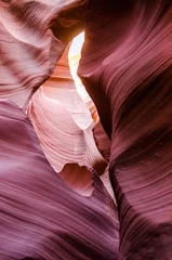 Poster de jardin Canyon Pink peach wave shapes photographed at slots canyons in Arizona with blue sky