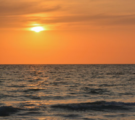 A beautiful sunset over the Gulf of Mexico on Indian Rocks Beach, Florida.