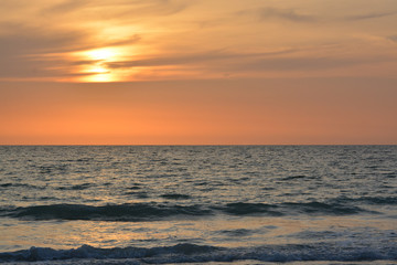 A beautiful sunset over the Gulf of Mexico on Indian Rocks Beach, Florida.