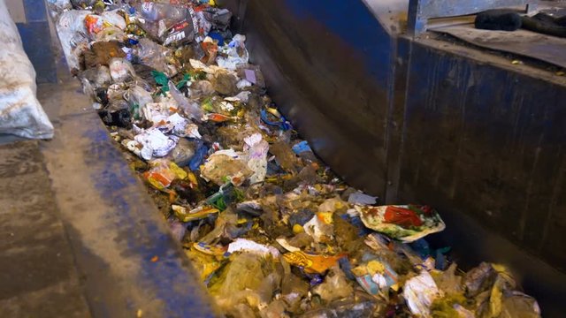 Close up of waste moving on conveyor.4K.