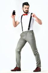 Bearded man, caucasian hipster with moustache and perfume bottle
