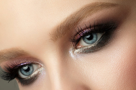 Close Up Of Blue Woman Eye With Smokey Eyes Makeup