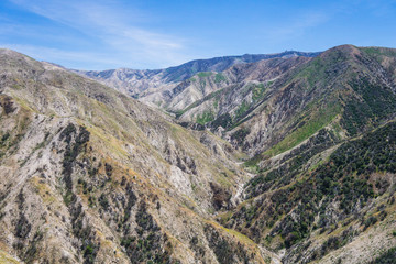 Fototapeta na wymiar Line of canyons lead through California mountains.