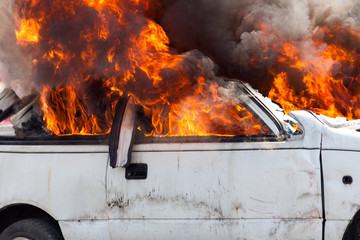 burning car burning car - Exercise firefighters