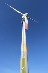 wind turbine against blue sky