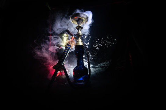 Hookah hot coals on shisha bowl with black background. Stylish oriental shisha