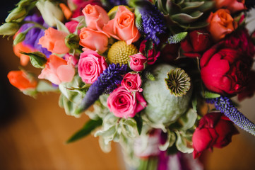 Bright and stylish bouquet of the bride. Wedding floristics and details.