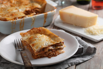 Lasagna Bolognese on a rustic table
